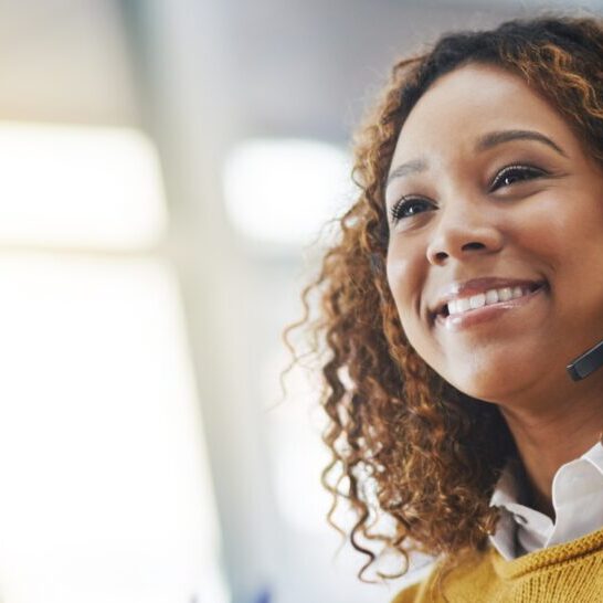 Young african woman, call center agent or listen on voip headset with mockup space, lens flare or contact. Girl, customer service or tech support crm with smile, headphones or microphone at help desk